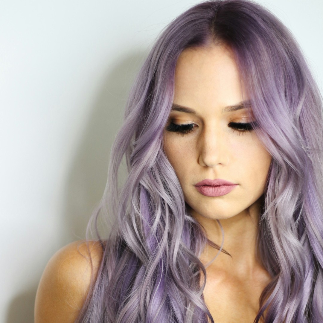 a woman with vibrant hair color