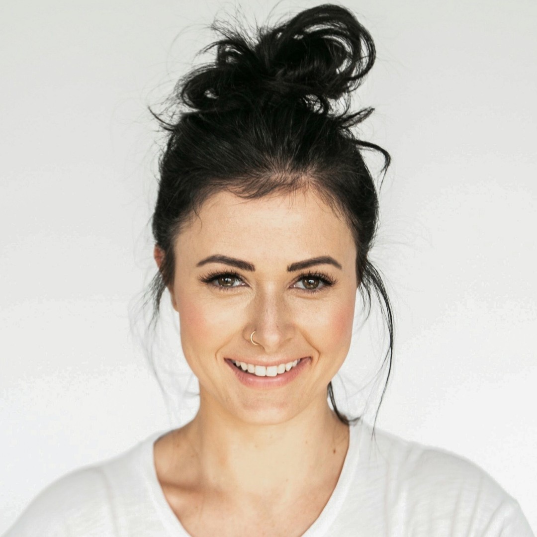a smiling woman with long hair
