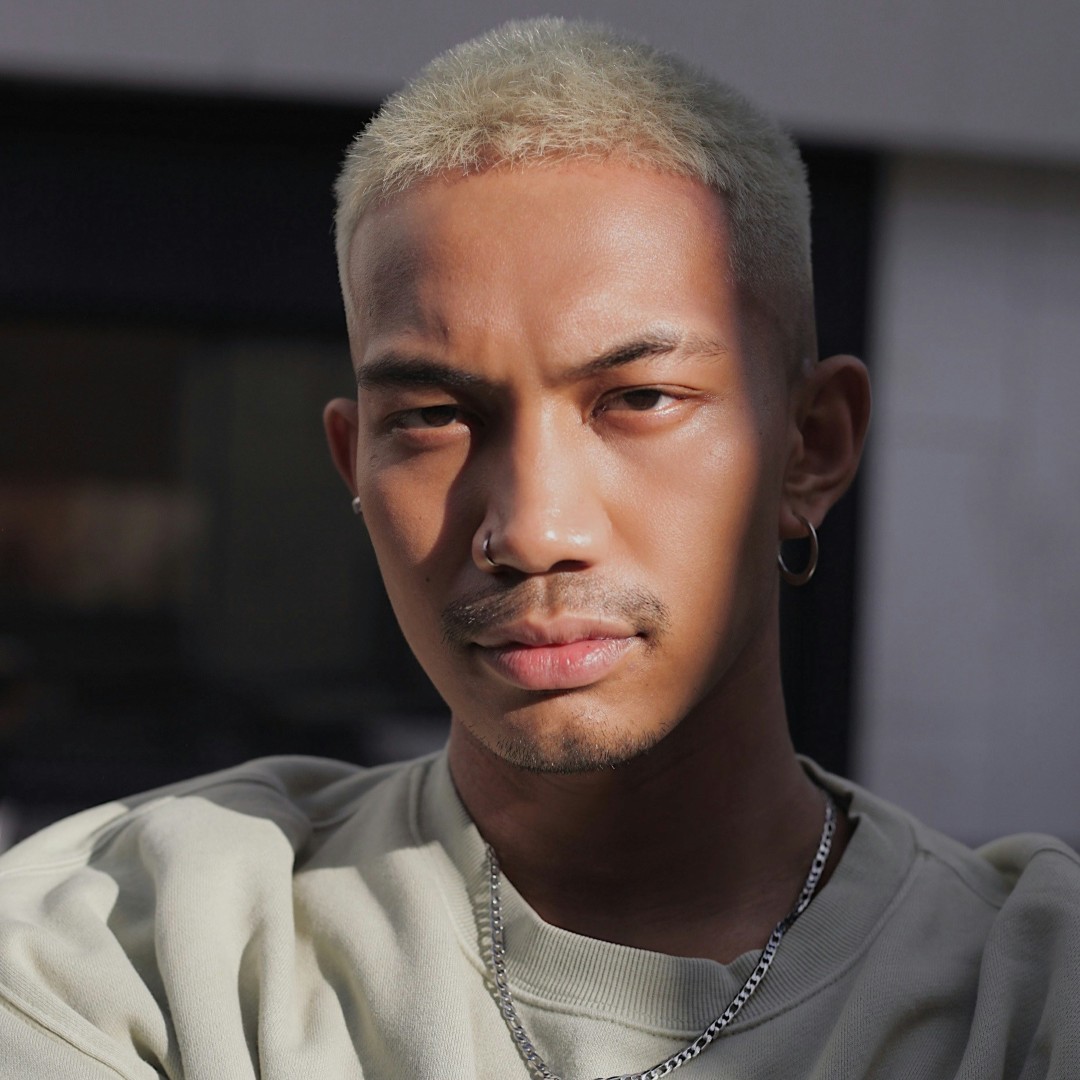 a man with short blond hair