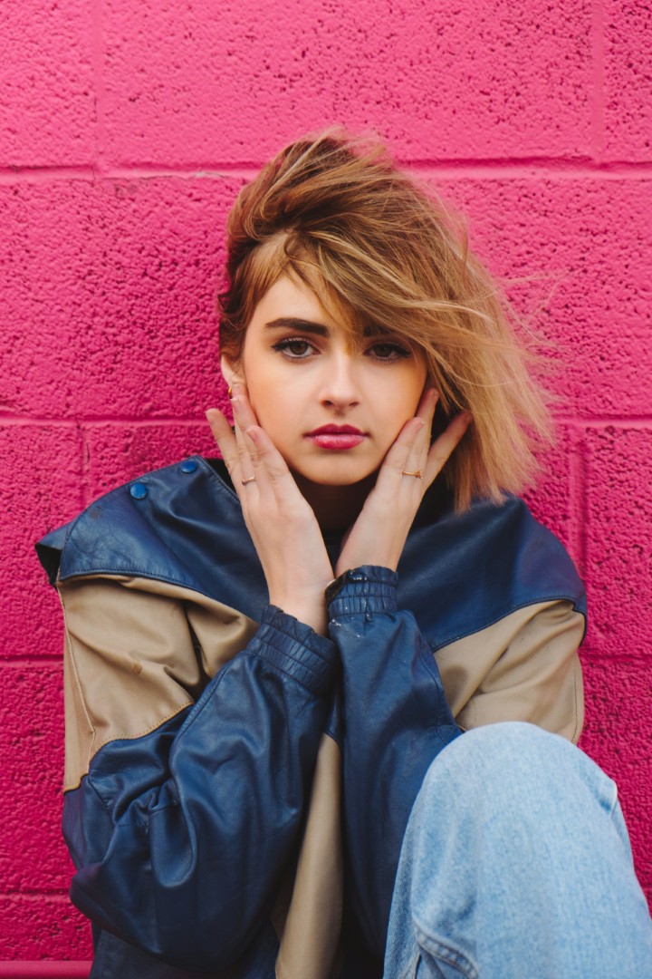 a woman with straight blond hair
