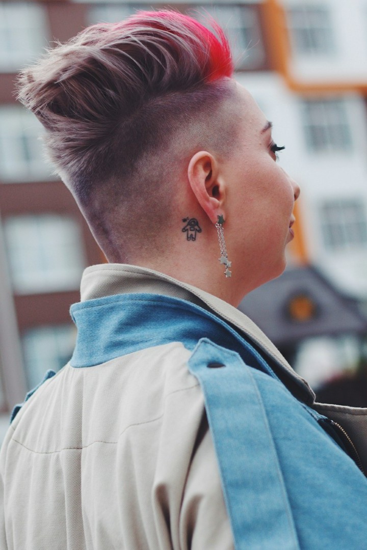 a woman with short hair