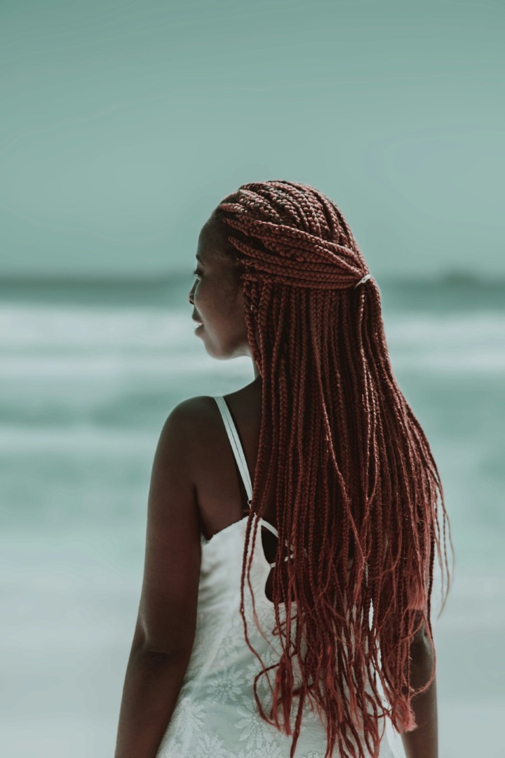a woman with braided hair