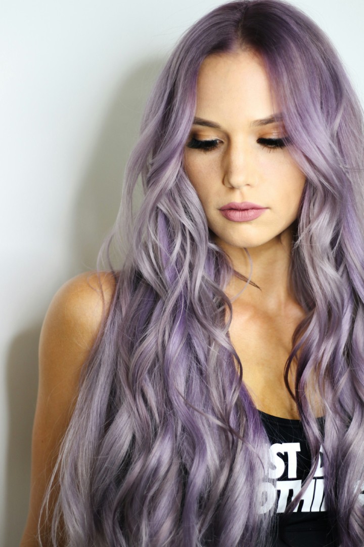 a woman with long purple hair